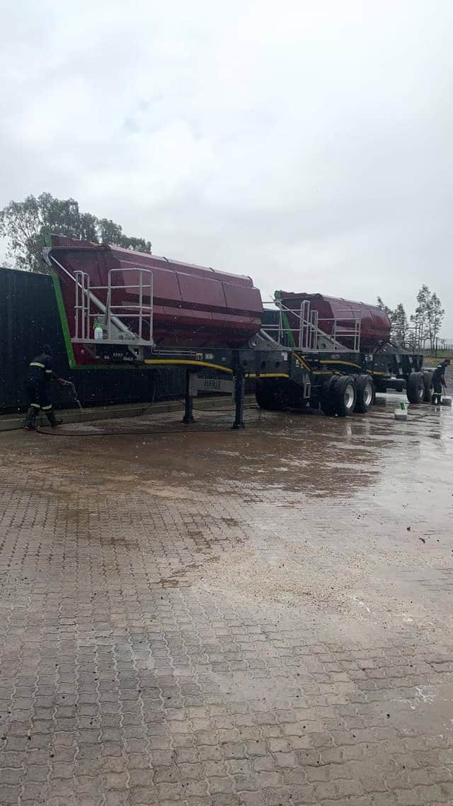 DKL maroon side-tipper fleet at depot