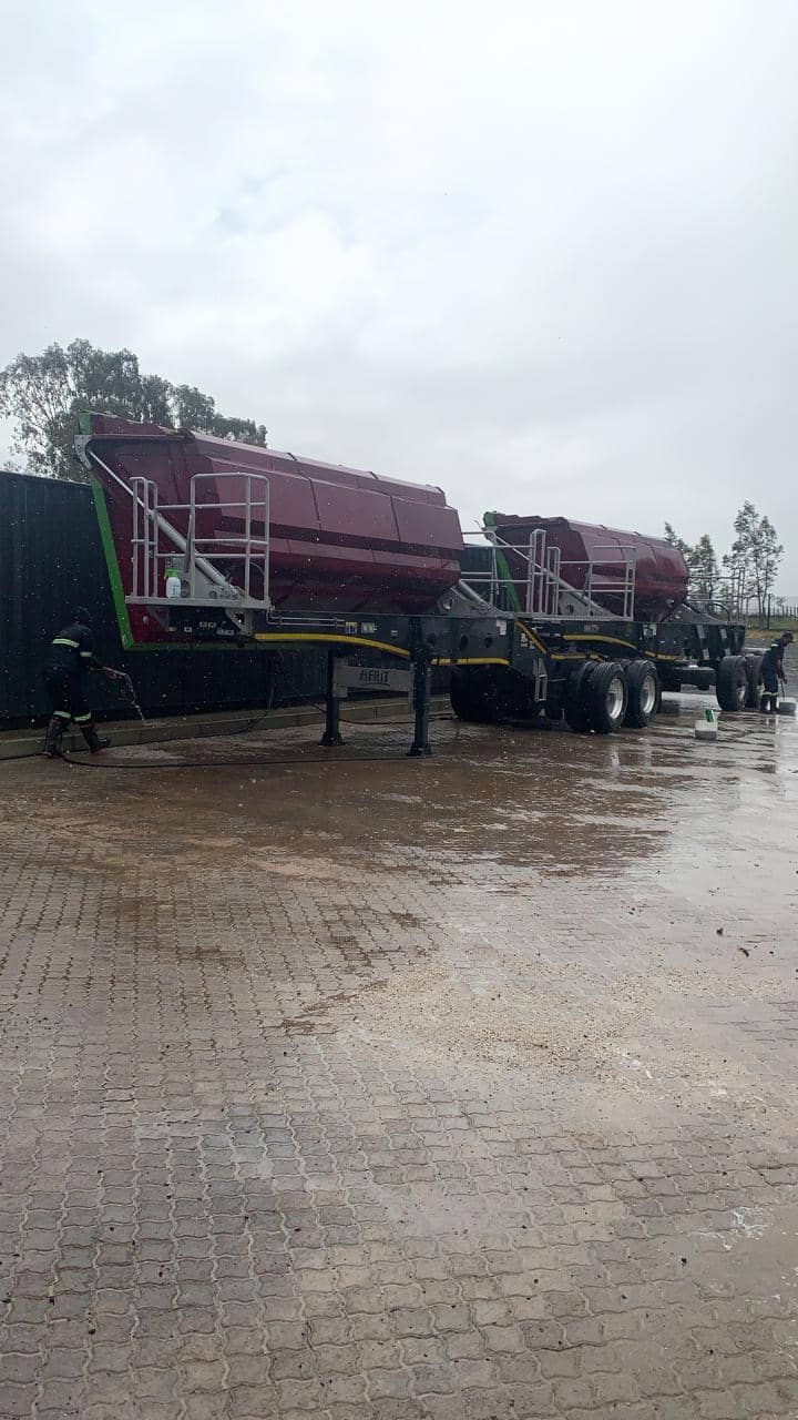 DKL maroon side-tipper fleet at depot